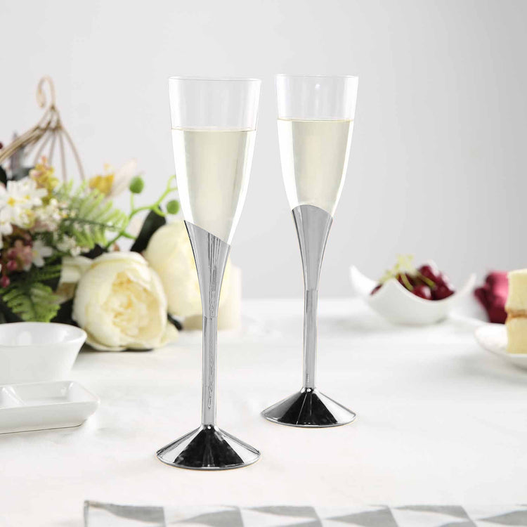 Clear 5 oz Plastic Champagne Flutes With Silver Detachable Base Disposable