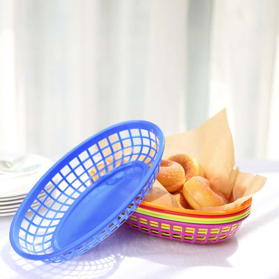 Colorful plastic serving basket with donuts, on a table.