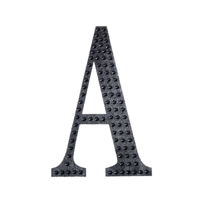 Black letter "A" with textured embellishments on a white background.