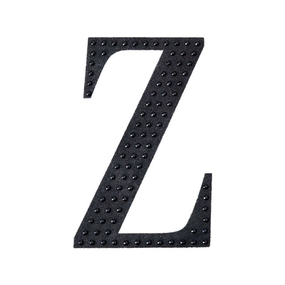 Black foam letter "Z" with raised dots design on a white background.