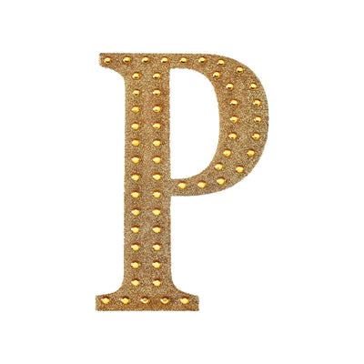 Gold marquee letter "P" with lights on a white background