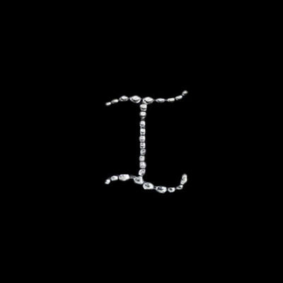 Stylized diamond letter "I" design on a black background.