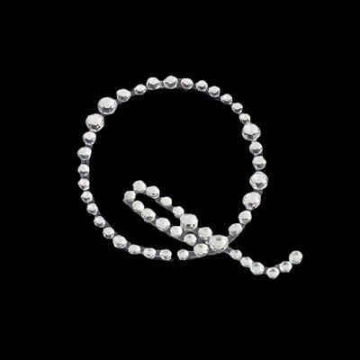 Rhinestone letter "Q" design in sparkling embellishments.