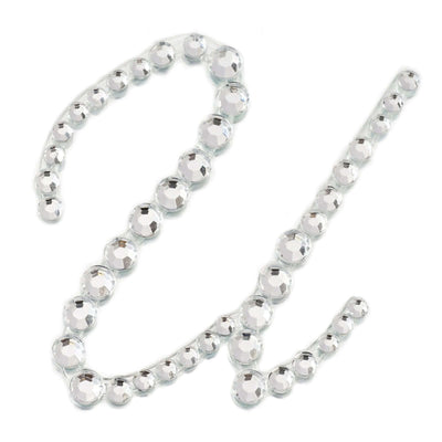 Silver rhinestone embellishments arranged in a decorative pattern