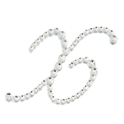 Rhinestone embellishment in a decorative swirl design