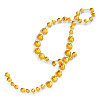 Yellow gemstone embellishment in a decorative swirl design