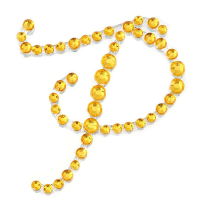Yellow rhinestone embellishments in decorative design