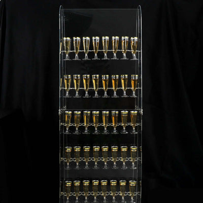 Acrylic display rack with multiple rows of shot glasses filled with beverages.