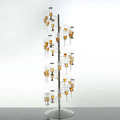 Champagne glass display tower filled with sparkling drinks.
