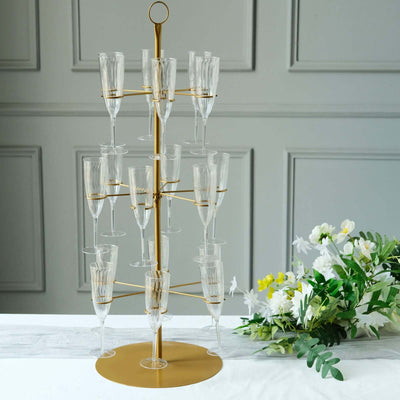 Elegant gold champagne flute tower with multiple glass holders.