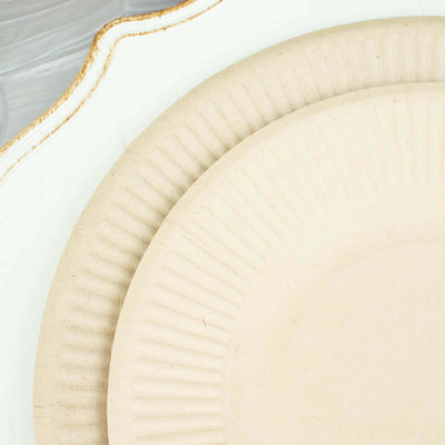 Eco-friendly disposable paper plates in beige and cream colors.