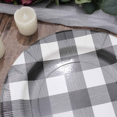 Black and white checkered paper plate on a wooden surface.