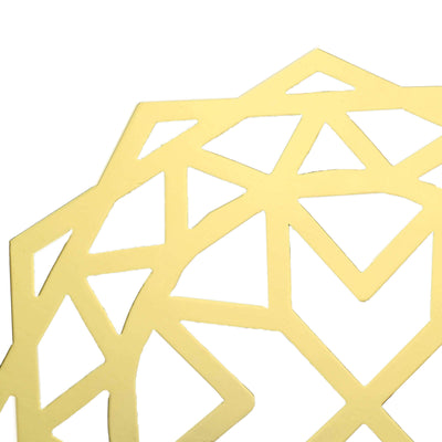 Yellow geometric design cutout on a plain background.