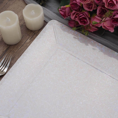 Decorative clear plastic table cover with floral pattern and pastel hues