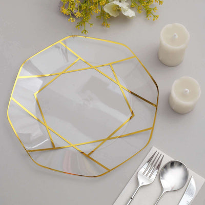 Elegant glass plate with gold geometric design on a neutral table setting.