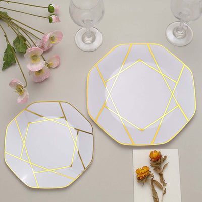 Geometric gold-accented plates in varying sizes on a neutral background.