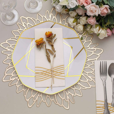 Decorative plate with floral arrangement on elegant table setting.