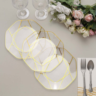 Geometric clear plates with gold trim, perfect for elegant dining.