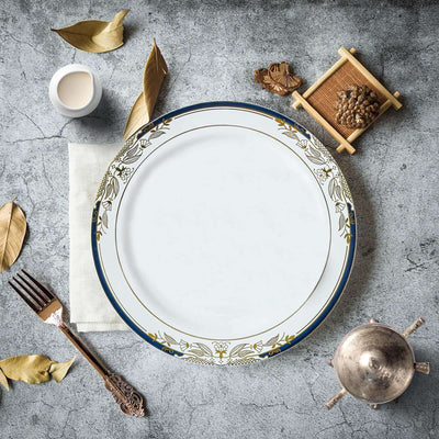Elegant white plate with gold floral design, surrounded by decorative elements.