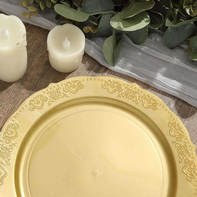 Elegant yellow decorative plate with intricate detailing and candles