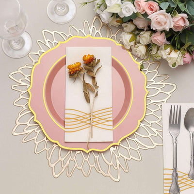 Elegant pink plate with floral decoration on a decorative placemat.