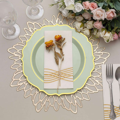 Elegant table setting with green plate, floral napkin, and decorative placemat.