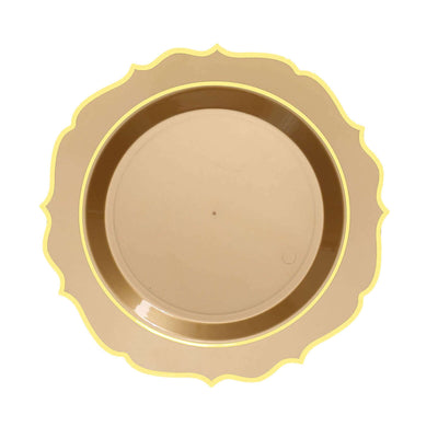 Gold decorative plate with scalloped edges.