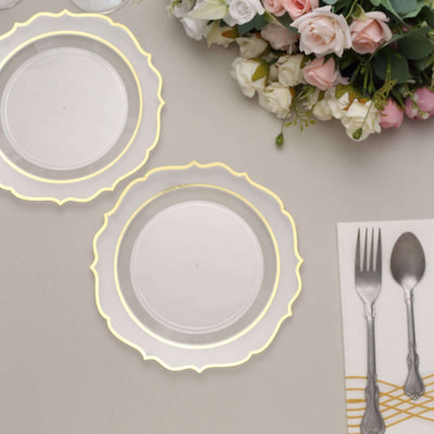 Elegant clear plates with decorative edges, styled with floral accents.