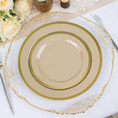 Elegant beige plates with gold trim stacked on a decorative charger plate.