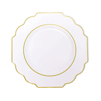 Elegant white plate with gold trim, scalloped edges.