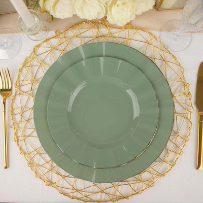 Green dinner plates on a gold wire charger with floral decor in the background.