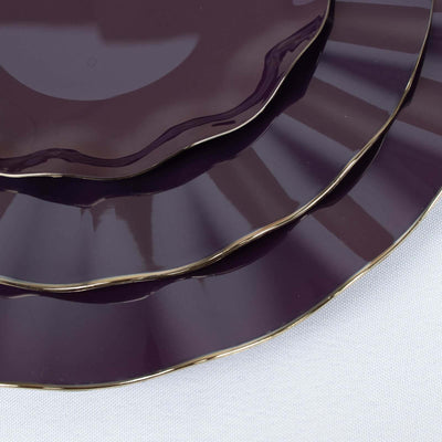Set of three elegant purple plates with gold edges.