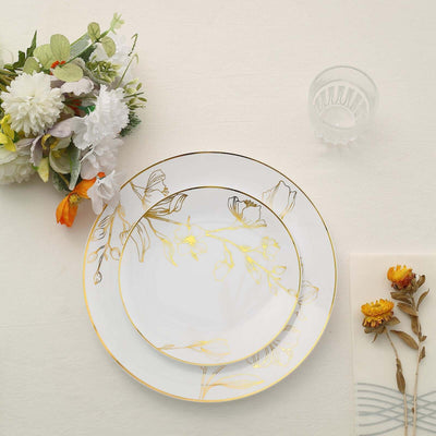 Elegant floral dinnerware set with gold accents and decorative flowers.