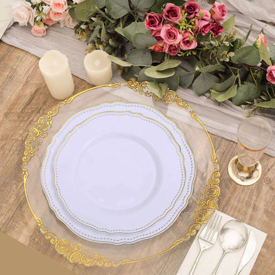 Elegant white plate with gold trim, surrounded by roses and candles.