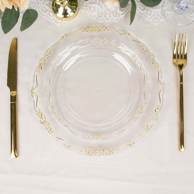 Elegant clear plate with gold detailing, accompanied by gold cutlery.