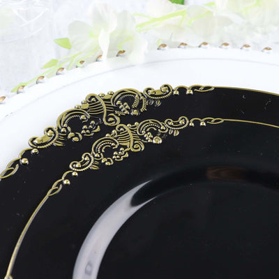 Elegant black plate with gold embellishments on a white background.