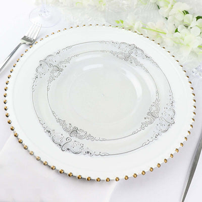 Elegant silver-trimmed dinner plate with decorative edge design
