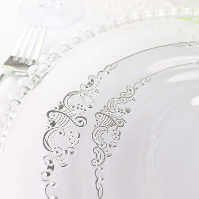 Clear decorative plate with intricate design details.