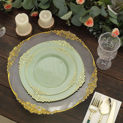 Elegant green and gold decorative plates set on a rustic wooden table.