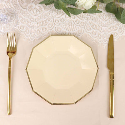 Elegant beige octagonal plate with gold trim, styled with gold cutlery.