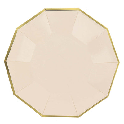 Octagonal beige plate with gold trim on a white background