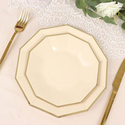 Elegant cream octagonal plate with gold trim on a lace table setting.
