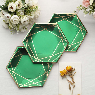 Green hexagonal plates with gold geometric design, set of three.