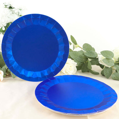 Blue paper plates stacked on a light background with floral accents.