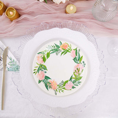 Floral-themed dinner plate on a beautifully set table.
