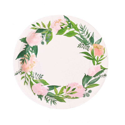 Floral wreath design on a round plate with pastel colors.