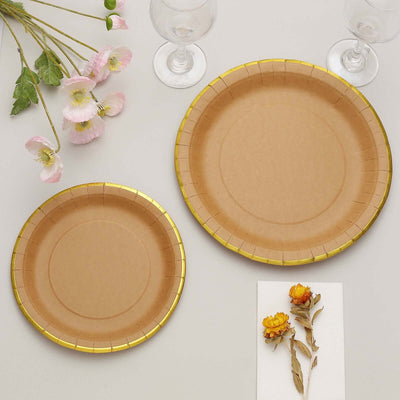Brown paper plates with gold trim, styled with flowers and glasses.