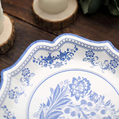 Blue floral decorative plate on a rustic wooden table.