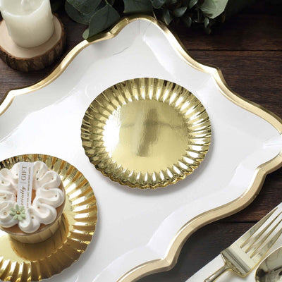 Gold decorative plates on a stylish serving tray.