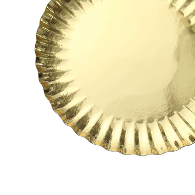 Gold foil cake plate with scalloped edges.